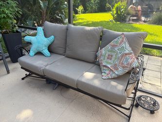 Vintage wrought iron glider