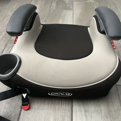 Almost New Booster Seat and toys 