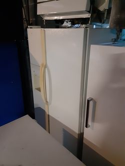 White side by side refrigerators