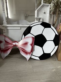 soccer ball and bow prop