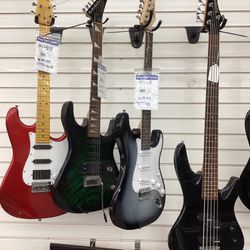 Electric, Acoustic, And Bass Guitars