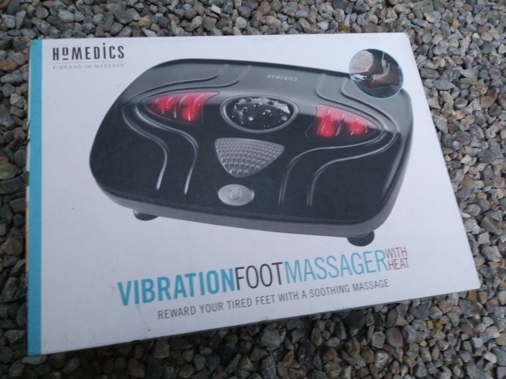 Vibration foot massager with heat. Brand new. I open but Never you