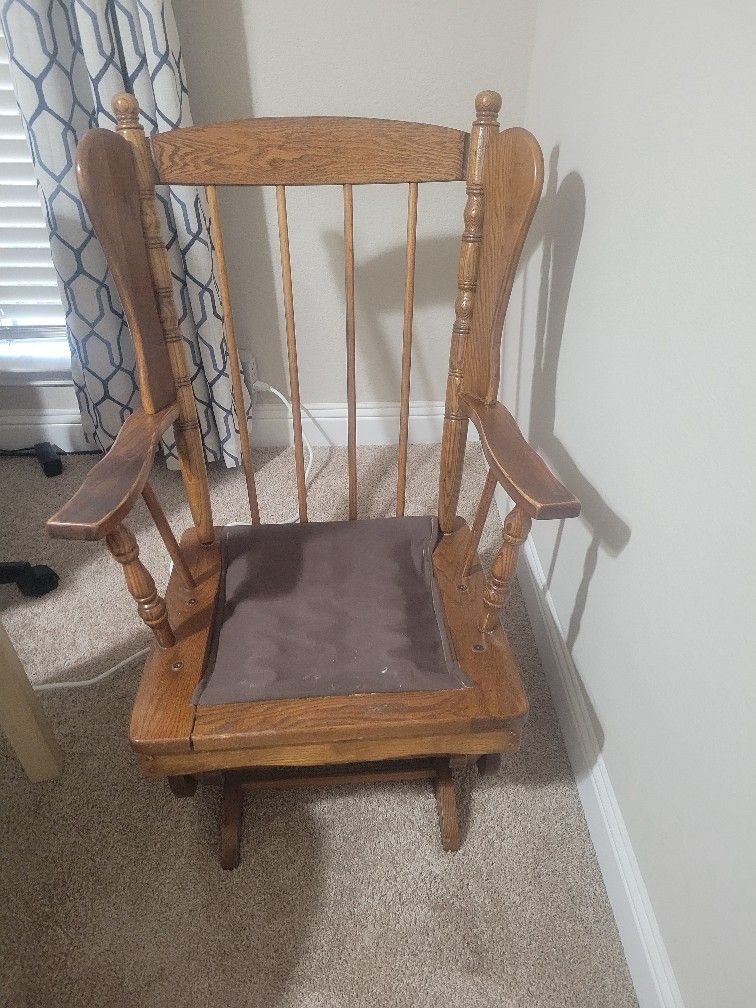 Wooden rocking (Glider) chair in a good condition