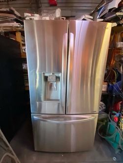 LG REFRIGERATOR FRENCH DOOR STAINLESS STEEL. FREE DELIVERY AND INSTALLATION