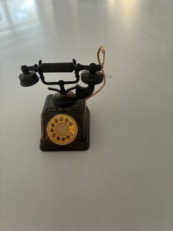 Teléfono miniatura antique