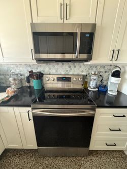 Samsung 30 in. 5.9 cu. ft. Single Oven Electric Range with Self-Cleaning and Convection Oven in Stainless Steel