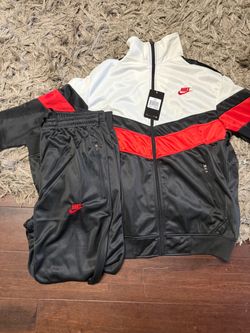 Nike black, red/white track suit with red Nike swoosh #tracksuit #athletic