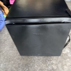 The Hisense 1.7 cu ft compact refrigerator in black is designed to provide cooling storage in small