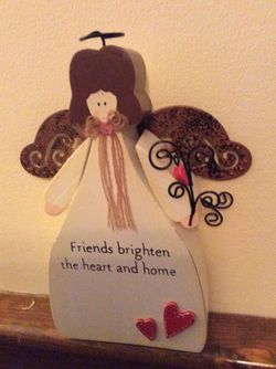 Russ angel wood and metal Friends brighten the heart and home
