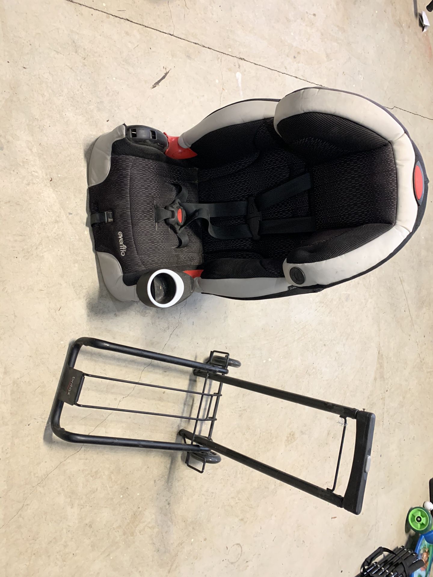 Britax car seat carrier and Evenflo car seat.
