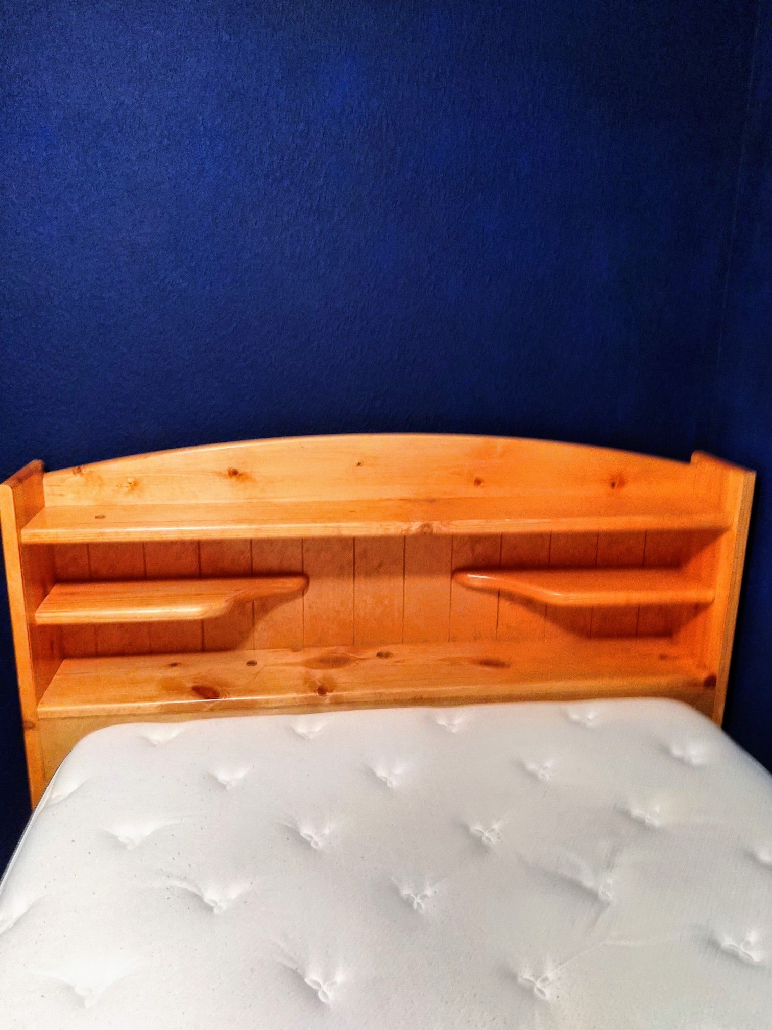 Bed frame with headdress