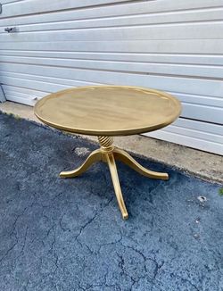 Gold wooden small coffee t a b l e / end t a b l e … 30” wide. 21” depth, 18” high … $40
