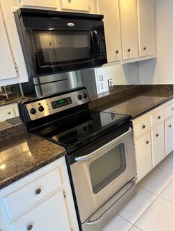 Whirlpool slide in range and over the stove microwave