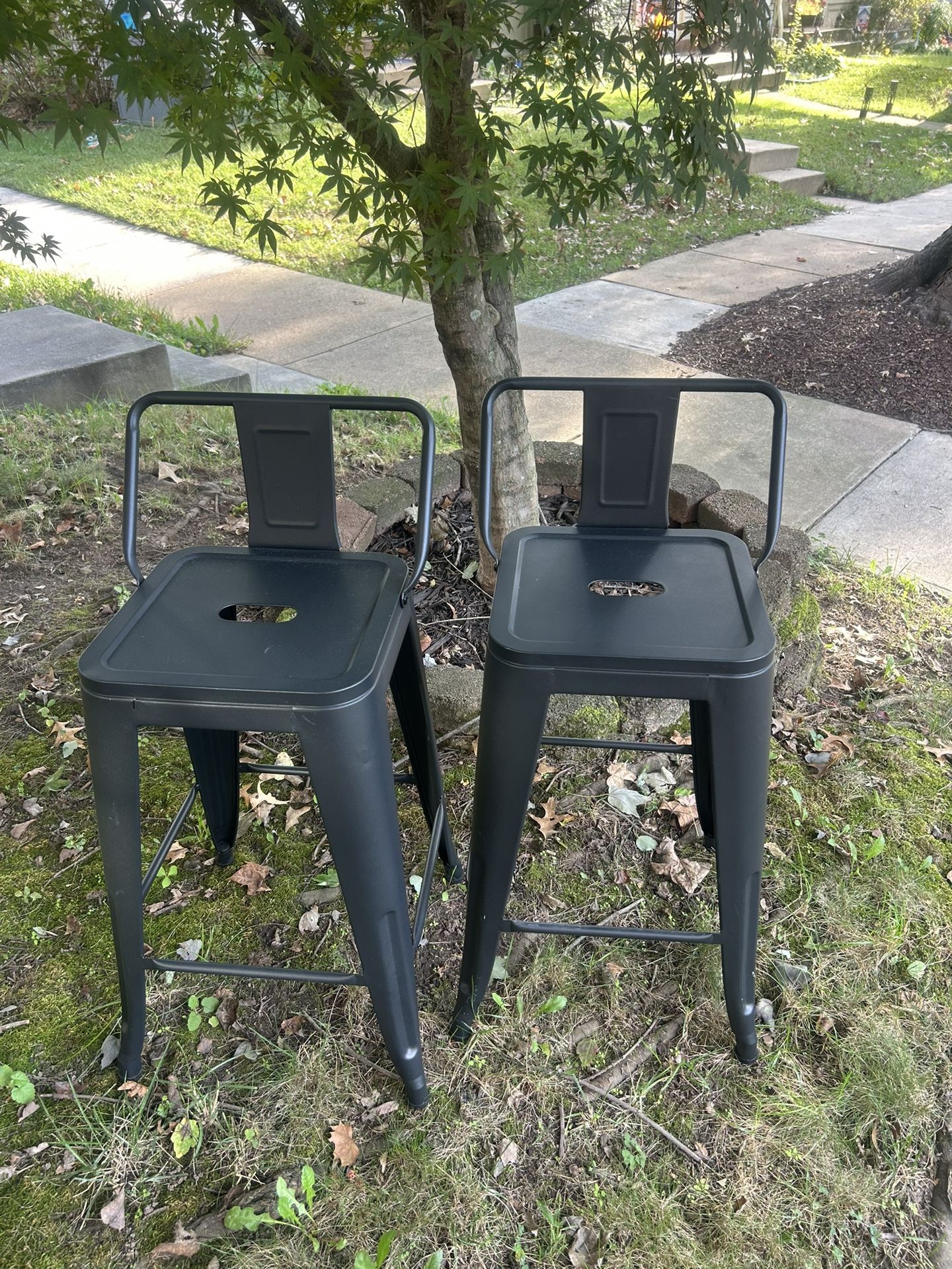 SET OF 2 PRE-OWNED VINTAGE LOOKING BLACK STEEL STOOL