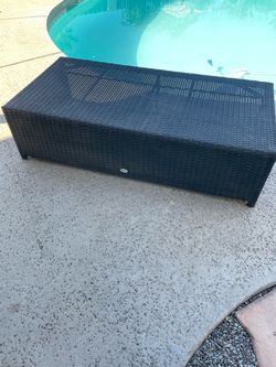 Wicker brown outdoor coffee table - 47 inches wide/ 33 inches deep/ 12 inches high