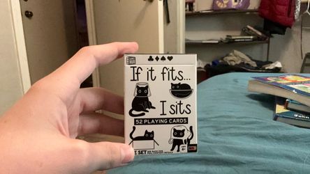 If it fits it sits 52 playing cards