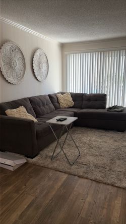 Semi used grey sectional sofa