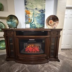 Beautiful fireplace /tv stand 7 colors of flames 70” inch long in excellent condition