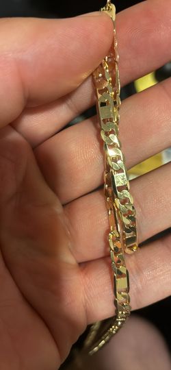 Gold colored necklace