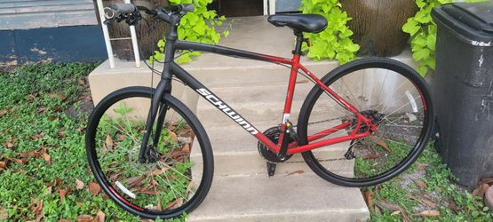 Schwinn Kempo Hybrid Bike, 700c wheels, 21 speeds, mens frame - red
