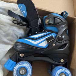 Brand new in box kids roller skates 4 (size adjustable 10j to 13 j)