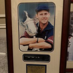 framed photograph commemorating Arnold Palmer's final British Open appearance at St. Andrews in 1995