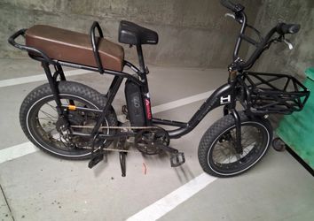 Black RadRunner Plus cargo e-bike by Rad Power Bikes. Ready to ride!