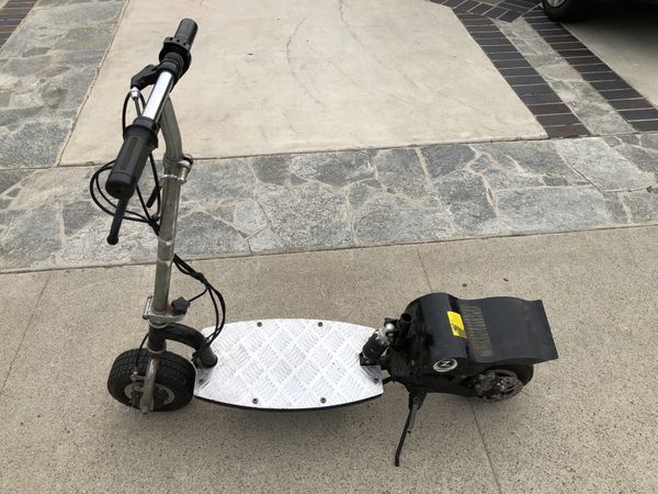 Zooma electric scooter 110 with batteries, 60 without. Firm price