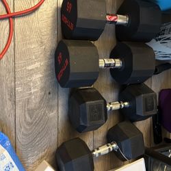 65 & 40 lb dumbell sets