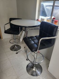 Mesa y bancos de Barra
