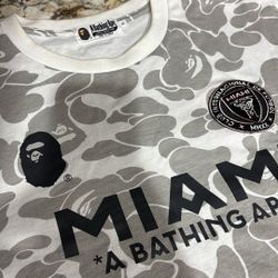 PSG X BAPE Designer tee.