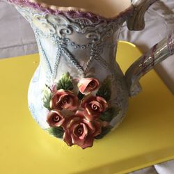 Beautiful 9” porcelain vase with 3 D flowers