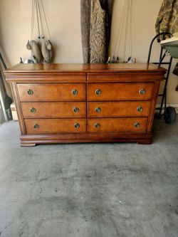 Dresser..8 Drawers..64 by 35 by 18.. Good Shape