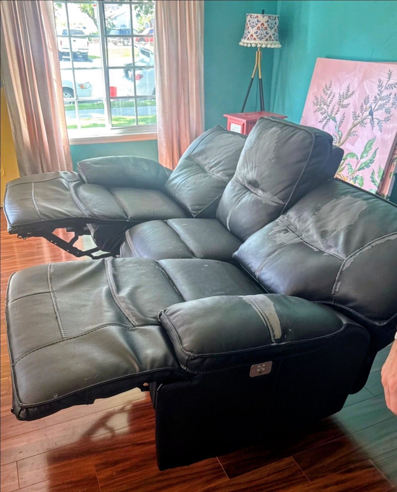sofa / loveseat seat double recliner with USB ports....please see the pictures the top layer is peeling
