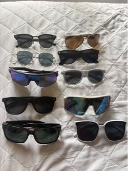 Assortment of sunglasses (Raybans and Oakleys included)