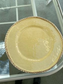 4 Pottery Barn plates or chargers