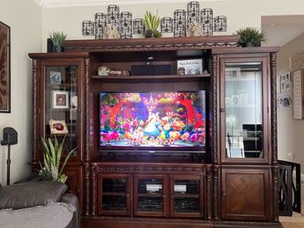Ornate Dark Wood Entertainment Center