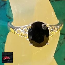 BLACK TOURMALINE WITH OPEN CUT, FILIGREE SHOULDERS. STERLING SILVER. SIZE 9
