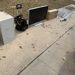 $49 FIRM EACH - TV, FILE CABINET *GARAGE CLEANOUT - gold shelves left