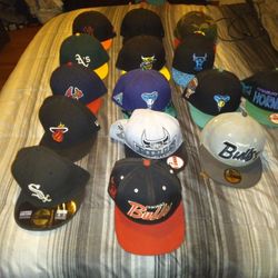 ALL OFFICIAL hat lot... selling as is or individually..... some may need a quick cleaning