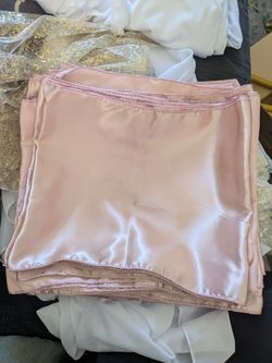 Light pink satin table runners
