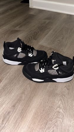 Air Jordan 4 Black and White Sneakers