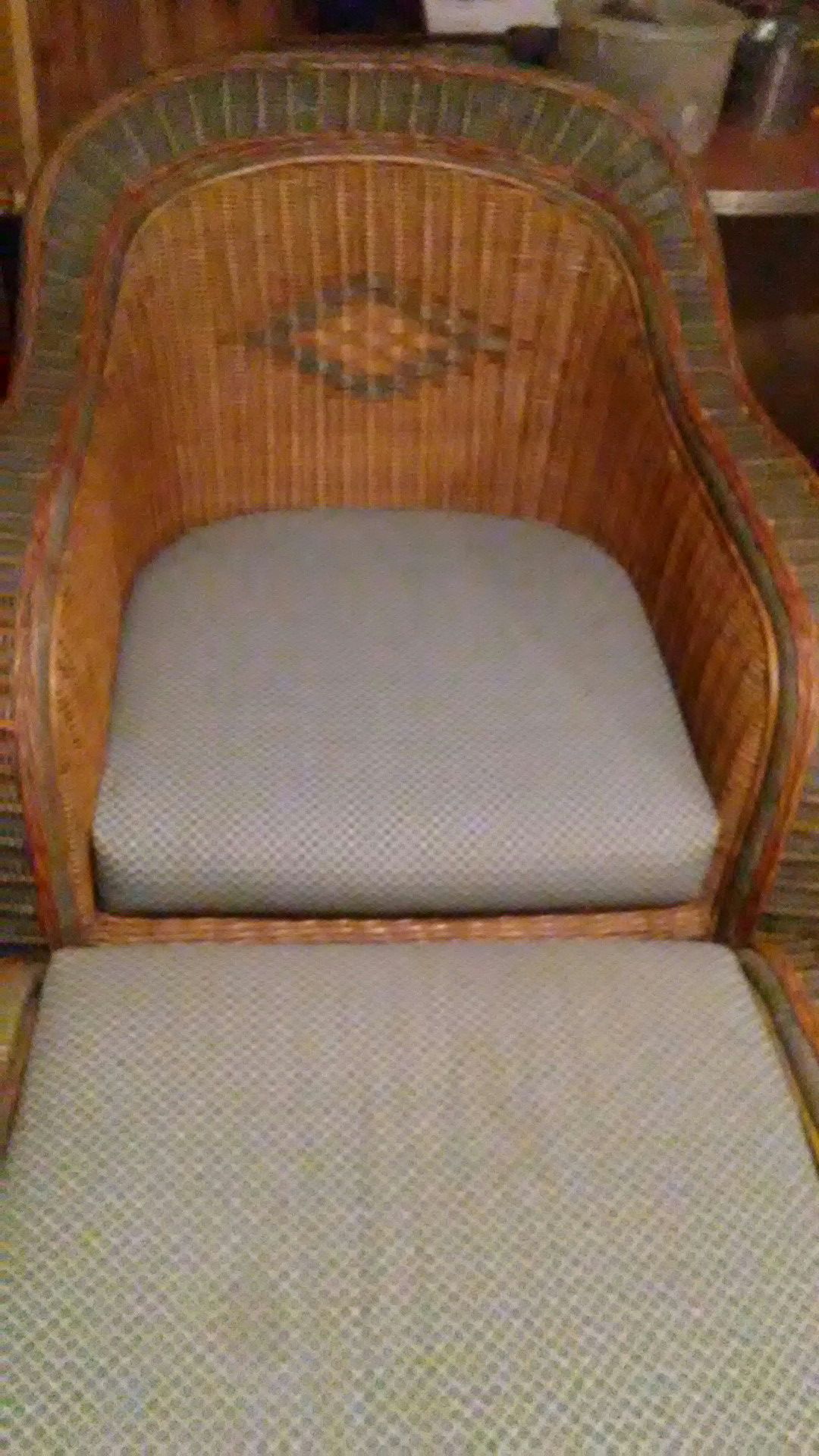 Vintage rattan chair and ottoman