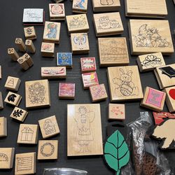Wooden rubber stamp bundle. over 100 stamps