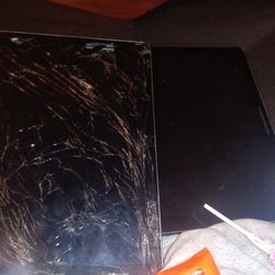 Broken Apple iPad . And Google Tablet 
