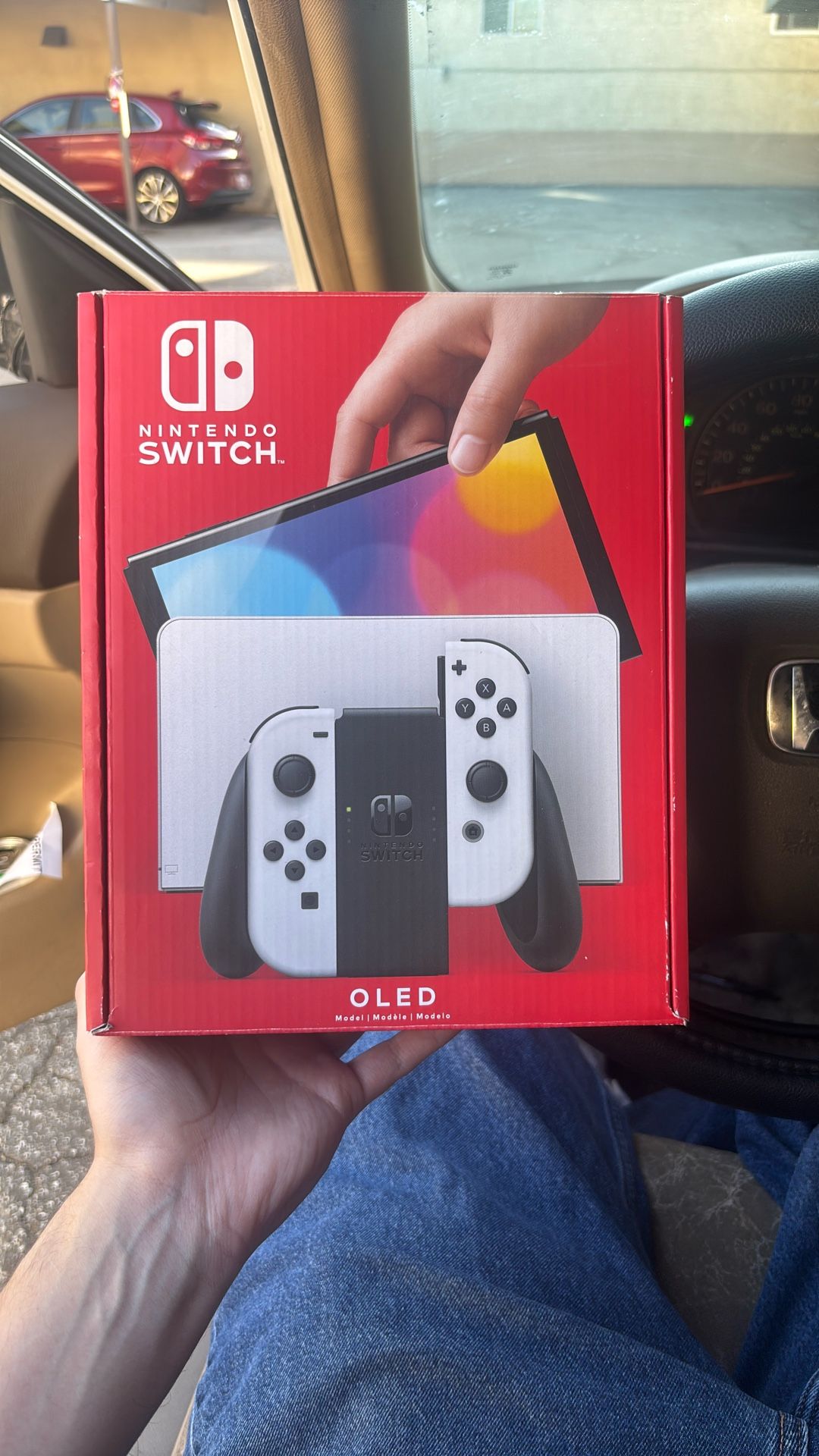 Nintendo Switch (OLED) with Mario Kart 8 Deluxe