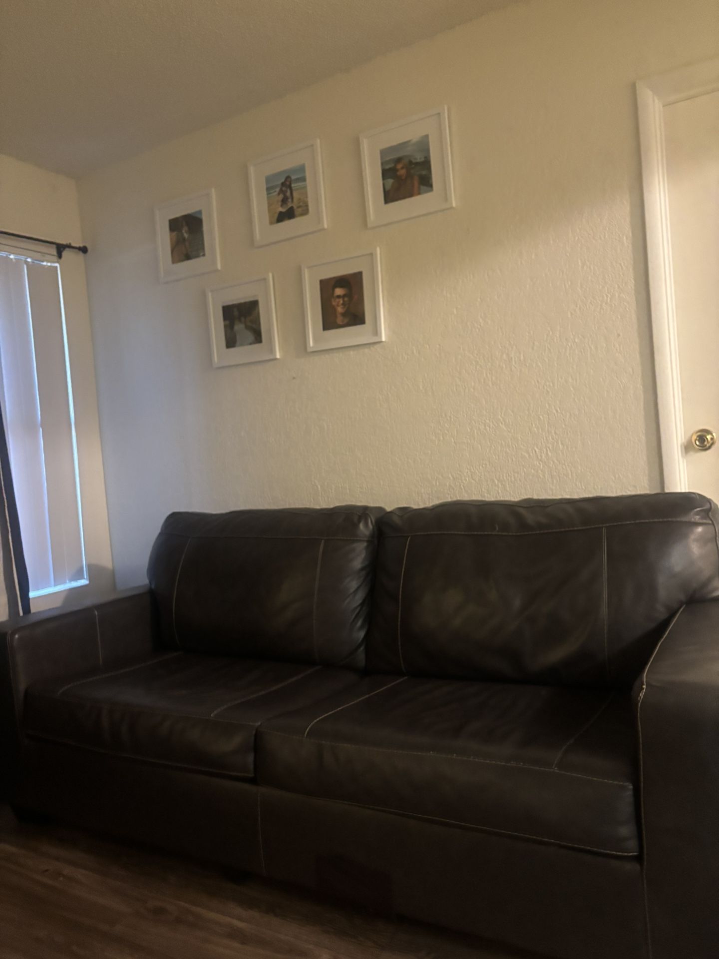 Gray Leather Sofa With White Stiching