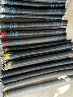 New Garage Door Springs, New & Used Door Panels, New Openers 
