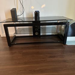 Glass and steel Entertainment stand/tv stand