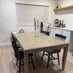 TABLE AND CHAIRS BOTH SOLID HEAVY WOOD WITH LEAF EXTENSION 